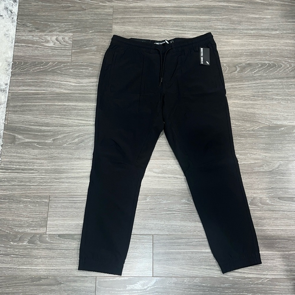 Stone falcon joggers. Size L. NWT